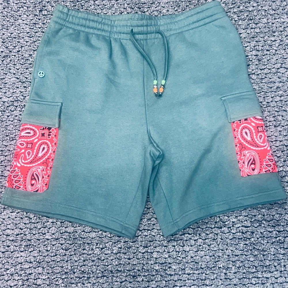 Teal Shorts with Red Paisley Accents